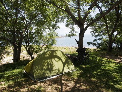 Tent and bike at lake shore